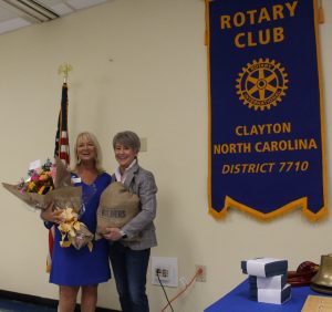 Dana Wooten and Tara Abernathy Exchange Gifts